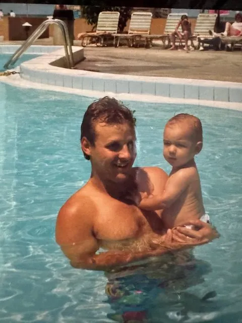 men-with-son-swimming men-with-son-swimming