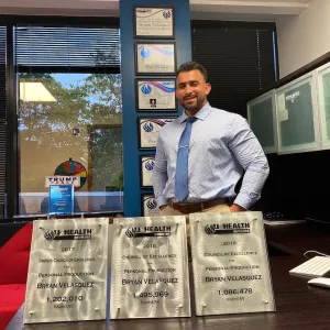 bryan-with-his-awards