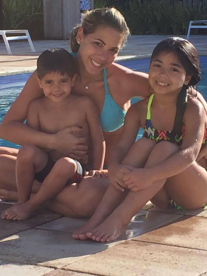 Mara and kids by pool